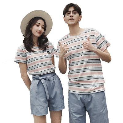 Couple wear summer beachwear striped suit