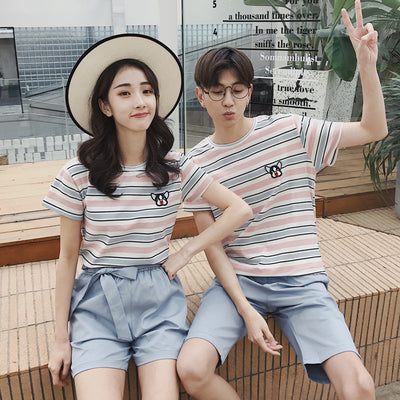 Couple wear summer beachwear striped suit