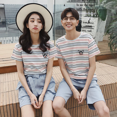 Couple wear summer beachwear striped suit