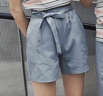 Couple wear summer beachwear striped suit